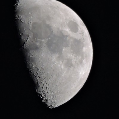 Taken 4/26/15. Half moon in the evening sky using a Nikon P600.