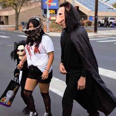 I captured these three as they crossed the street downtown Clarkston, Halloween October 31, 2018. Taken by Mary Hayward.