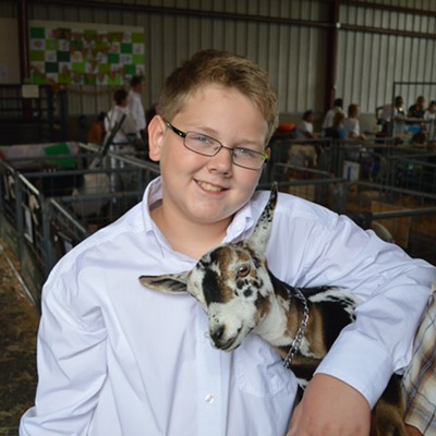 Picture taken September 24, 2015, at the Nez Perce County Fair by Terri Elsberry. Picture is of Silas Elsberry, 11 of Lewiston,&nbsp;and his 4-month-old Nigerian Dwarf goat, E-Farms S Omelette, hanging out before they go into the show ring taking Grand Champion.&nbsp;Parents are Russell and Terri Elsberry