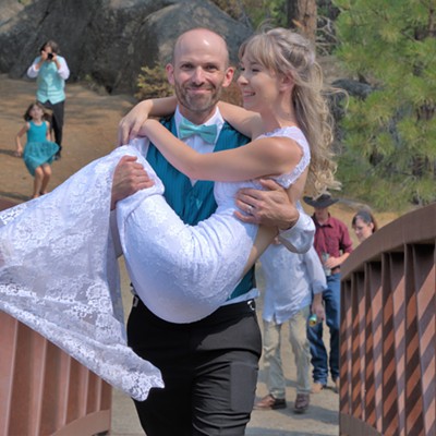 Our son Scott got married to his beautiful bride Lisa at the Winchester Lake Park August 6, 2021. He carried her across the walking bridge.
