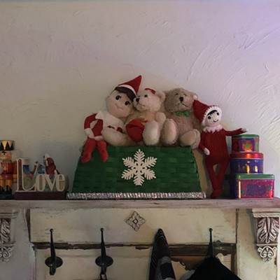 Elves Hip and Hap are photobombing love bears the &#147;Wallflowers&#148; at Holmes House. Photo taken on Dec. 12, 2017. Photo By Marcy Holmes of Lewiston Idaho. Taken at my houses&#146; coat rack for Elf on a Shelf picture share.