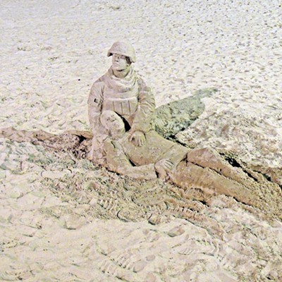 This image of a sand culture honoring US veterans for their service and sacrifice was taken by Leif Hoffmann (Clarkston, WA) in the evening of November 20, 2022 while walking the historic Seaside Promenade at the Oregon Coast.