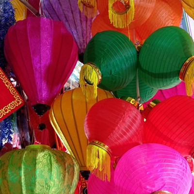 The preparations throughout Vietnam for the Tet lunar new year bring forth an amazing array of colorful lights and flowers. The lanterns in this photo were seen in Hanoi in mid-January, with the Tet multiday celebration early in February. Photo by Duane DeTemple of Pullman.