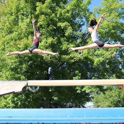Members of the 360 Gymnastics team warm up&nbsp;on the float before the start of the Lewiston Roundup Parade, Sept. 10, 2016. Shown are Kendall Wallace, 10, of Lapwai, and Loreal Ellenwood, 13, of Lapwai. Photo taken by Jennie Fiske.
