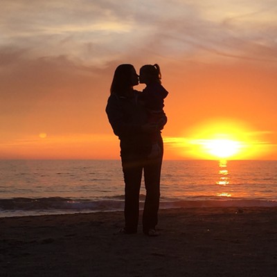 Taking an evening walk on a beach near Malibu, Calif., in mid-February, former Lewiston resident Katie (Chetwood) Kaye is sharing a special moment with her&nbsp;2-year-old&nbsp;daughter, Kendall. Photo was taken by Katie's husband, Mitch.