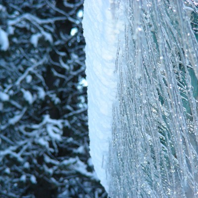 Icicles form as snow moves off metal roof on home. Photo taken Feb. 24, 2011, by Judy Tackett at their home on Moscow Mountain.