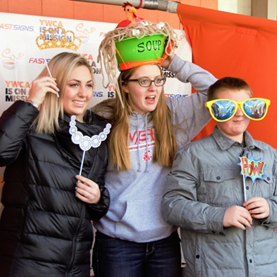While waiting in line at the YWCA for our soup, I observed these young people posing in the selfie booth with fun props. Mary Hayward of Clarkston captured this February 23, 2018.