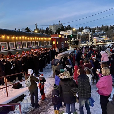 Pullman Holiday Festival - the Sig Ep fraternity at WSU serenades a big crowd before Santa arrives at the Pullman Depot Heritage Center on Saturday December 3rd. Event created by the Pullman Chamber of Commerce, Pullman Civic Trust, and the Downtown Pullman Association.
