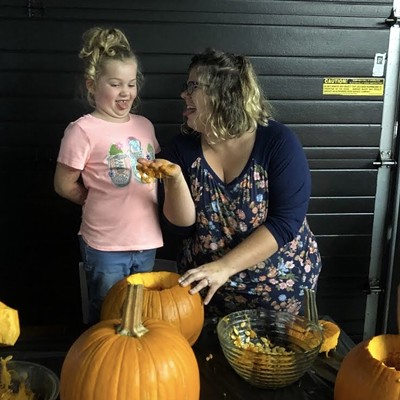 Beth Andrews (age 5) and her mom, Jessica, carving pumpkins at home in Moscow on Friday night.