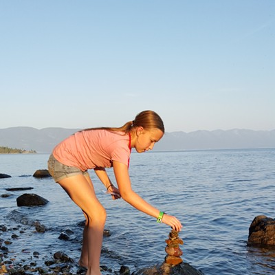 Reagan Offerdahl, 13 of Lewiston, and daughter of Gary and Brenda Offerdahl, balances rocks at the Flathead Lake United Methodist Camp during her week at Middler Camp. The photo was captured by Gary Offerdahl.