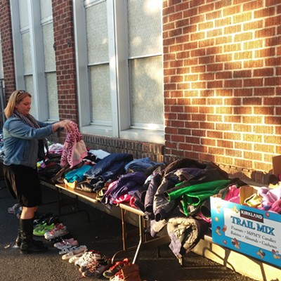 Cherisse Hill, a third-grade teacher at Russell Elementary School in Moscow,&nbsp;folds clothes in preparation for the first ever Russell Elementary Clothing Exchange. The event, organized by Hill, was so successful that plans are already being made to have the event return in the spring. Children&nbsp;from throughout the Moscow community benefited from hundreds of clothing donations.