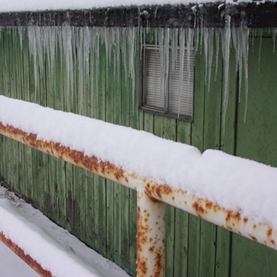 This building backs up to Troy highway and I liked the color combination
with the snow and ice. Taken on Feb. 15.