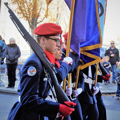 Many saluted as the flags went by in the Veterans Day Parade in Lewiston, Nov. 11, 2017. Captured by Mary Hayward of Clarkston.