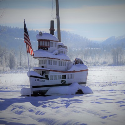 Ship Sailing in Snow