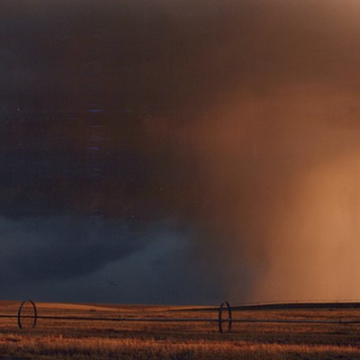 A summer hail storm over a stubble field. Taken from our front lawn in Warden, Washington by Kent Zirker in the summer of 1985.
    I&#146;m not sure if you will accept a picture from this far away and that long ago. I just found it in a pile of my pictures. It is one of my favorites.
