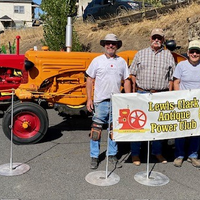 The Lewis-Clark Antique Power Club were the featured speakers at the Palouse People as part of the Pullman Depot Heritage Center's Depot Days August 18 and 19. Pictured above are Jim Allen, Jack Fulfs, Everett Martin and Gary Simpson, members of the Lewis-Clark Antique Power Club with their respective tractors.