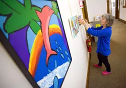 Curator Jennifer Rod had art for the Inflation Celebration on Tuesday at the Third Street Gallery in Moscow. The piece at left is by Natalee Rod. - MOSCOW-PULLMAN DAILY NEWS