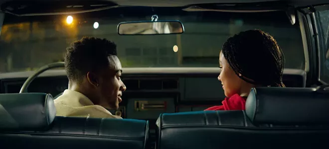 This image released by 20th Century Fox shows Algee Smith, left, and Amandla Stenberg appear in a scene from "The Hate U Give." - 20TH CENTURY FOX VIA AP