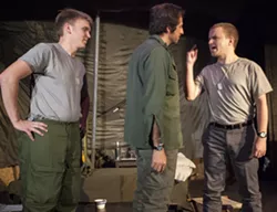 Capt. Frank Burns, right, played by Alex Kyrios, attempts to order around Capt. Benjamin Franklin "Hawkeye" Pierce, center, played by Adam Goler, and Capt. Augustus Bedford "Duke" Forrest, played by Jonathan Shumate, during rehearsal for the Pullman Civic Theater production of M*A*S*H on Thursday at the Nye Street Theatre in Pullman.