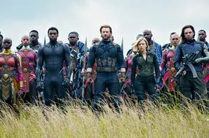 Front row from left: Danai Gurira, Chadwick Boseman, Chris Evans, Scarlet Johansson and Sebastian Stan are shown in a scene from “Avengers: Infinity War,” premiering Friday. -- Associated Press