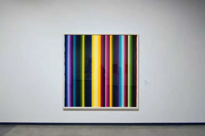 A print titled "Baroque Time Machine 3" by artist Polly Apfelbaum hangs on a wall in the Jordan Schnitzer Museum of Art at Washington State University September 4. - KAI EISELEIN/DAILY NEWS