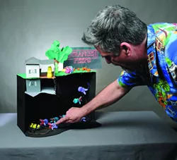 Asotin's Bill Blair, winner of the 2018 contest, explains how he had to glue faces on his Peeps, since Sharpies don't work. - TRIBUNE/STEVE HANKS