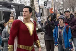 This image released by Warner Bros. shows Zachary Levi, left, and Jack Dylan Grazer in a scene from "Shazam!" (Steve Wilkie/Warner Bros. Entertainment via AP) - STEVE WILKIE/WARNER BROS. ENTERTAINMENT VIA AP
