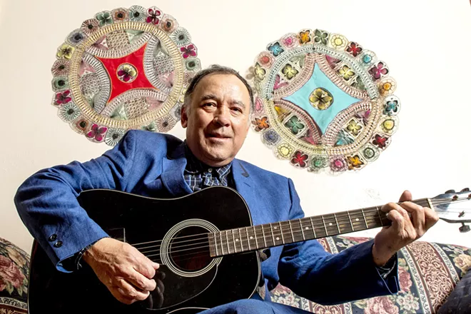 Edgar Galeano sits in his home for a portrait on Monday. Galeano's song "Pájaro Choguy" was included in a Latin grammy-nominated album. August Frank/Tribune - AUGUST FRANK/TRIBUNE