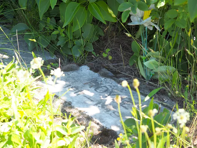 Several children from the Whybark family died in the early 1900s, including 8-year-old Royal, whose grave is shown here. According to newspaper reports from the time, at least two Whybark children died of the influenza pandemic in 1919. Tara Roberts/for Inland 360 - TARA ROBERTS/INLAND 360
