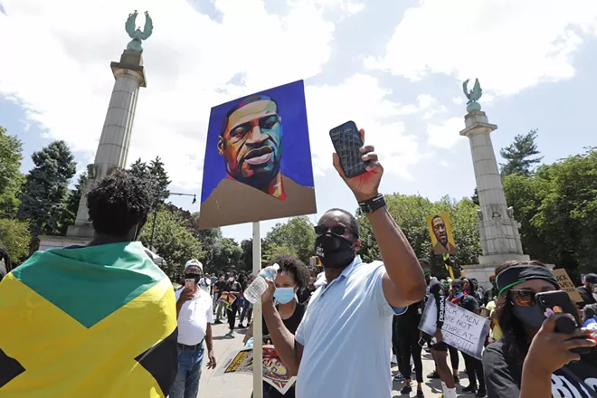 A protester uses his cell phone camera to record during a Caribbean-led Black Lives Matter rally at Brooklyn's Grand Army Plaza, Sunday, June 14, 2020, in New York. - AP PHOTO/KATHY WILLENS