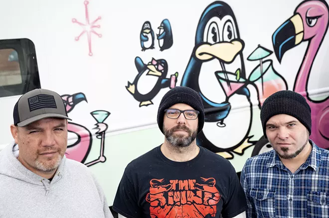 Laki Ah-Hi (left), Mason McCroskey (center) and Nathan Golla, all members of the Maple Bars, pose for a portrait behind Hogan's Pub in Clarkston on Monday. - PETE CASTER/TRIBUNE