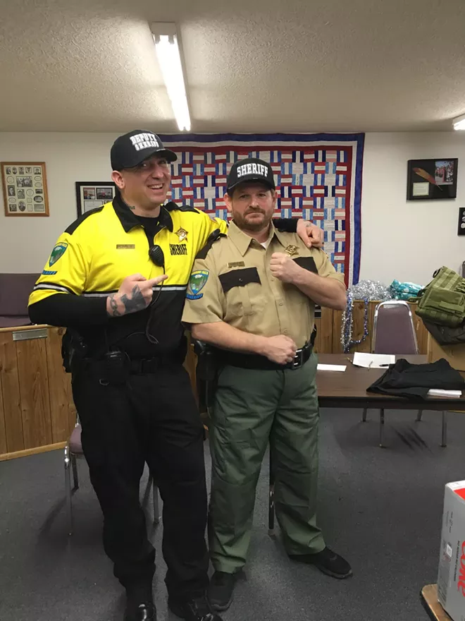 Michael Payne, left, playing Deputy Charlie Redtail and Steven Smith, of Lewiston, playing sheriff Bud O'Brian on the set of "Harmony Falls" at the Toledo Sheriff's Office in Toledo, Wash - CONTRIBUTED PHOTO