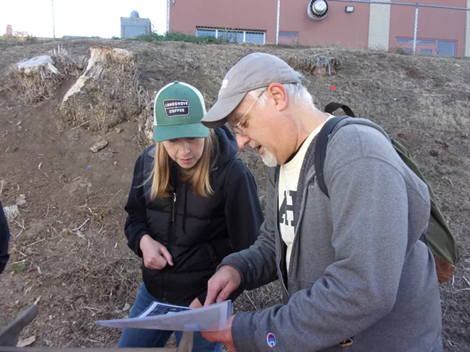 Mark Warner discusses the excavation plan at Moscow High School with site visitor and fellow University of Idaho employee and MHS alum Kim Salisbury. - MARK WARNER