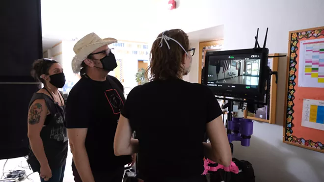 Assistant Director Jessica Winfree, Director Rantz Hoseley and Cinematographer Jendra Jarnagin do a final check on camera and lighting in the hall of Moscow's West Park Elementary School. - DAN BLAKNEY