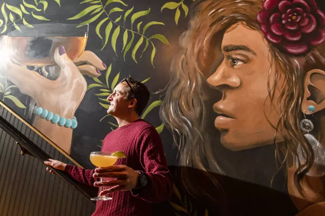 Head bartender John Leonardson poses for a portrait with his sunny holiday drink, the Captiva, inside Etsi Bravo, 215 E Main St., Pullman. - ZACH WILKINSON/INLAND 360