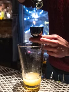 Head bartender John Leonardson makes a Captiva cocktail at Etsi Bravo in Pullman. - ZACH WILKINSON/INLAND 360