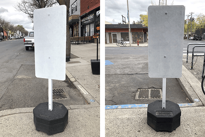 This photo shows a blank sign stand for the stormwater education mobile mini-mural contest.