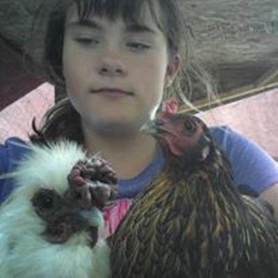 Emily Adams with her chickens, Ollie and Ana, taking a selfie. Submitted by Susan Adams of Clarkston.
