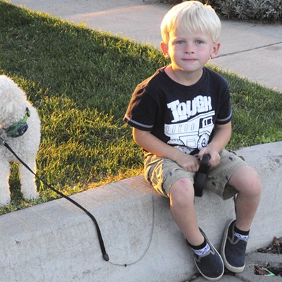 My grandson, Eli Craig, with my miniature Poodle, Bella at Sunset Park in Lewiston. Photo by Gail Craig of Lewiston.