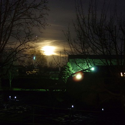 Full moon rising in cloud bank with Jupiter ... as seen from the Clarkston Heights.