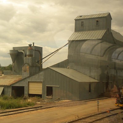 Touring South Dakota via train (Amtrak Empire Builder) from Spokane to Williston, North Dakota is a true adventure. Attached is a photo taken 8/17/2015, by John Farbo, from the train of a Montana high plains grain elevator long since closed and abandoned.