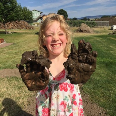 Alice Orton, 7, of Portland, delighted in playing in the mud of newly planted grass at her grandmother's house.&nbsp;She proudly showed her hands right before bath time. Alice is the daughter of Nathan Orton and Traci Goodrich. Photo taken by Lewiston's Nancy Orton on July 8, 2018.