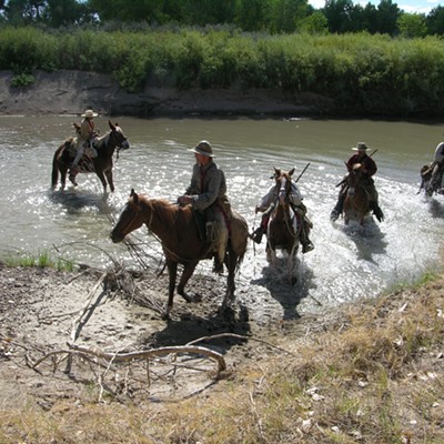 These historical interpreters are crossing the Arkansas River at Bent's Old Fort near La Junta, southern Colorado. In 1840 this was the Mexico/Spanish border with the United States and on the Santa Fe Trail to California. This era was the end of the beaver trade and the middle of the buffalo robe trade with St. Louis. Image by John Fisher, Lewis & Clark scholar, 24 Sep. 2015.