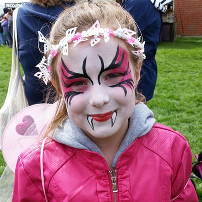 I snapped this photo of my granddaughter, Sophia Wilson, at the end of April, during our visit to the Dogwood Festival. Sophia made a bee-line for the face painting canopy, and it wasn't much of a surprise when sweet Sophia chose a design that was "in the pink." Sophia will celebrate her 7th birthday on August 28.