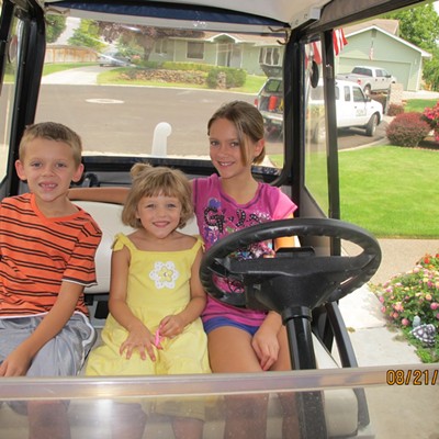 Ozzy, Maya and Anna all set to go for a ride in Grandma's golf cart ..Ozzy and Anna, children of Shauna and Bryan Cridlebaugh, Maya daughter of Donna and David Pankey