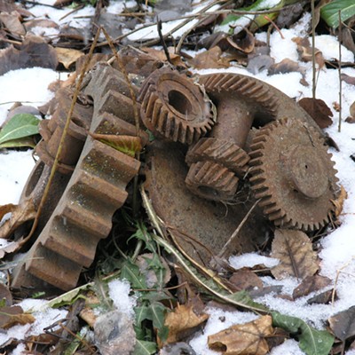 fresh snow on a pile of gears showing signs of what's to follow.