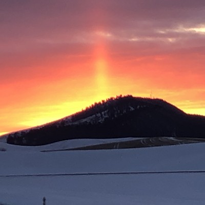 The sunset over Kamiak Butte displayed an rarely seen sun column. Photo taken Feb 6 outside of Palouse, WA by Tracy Lee Sievers, age 40 of Palouse.