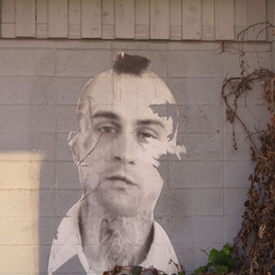 A larger-than-life portrait of Travis Bickle, Robert DeNiro's character in the classic movie, "Taxi Driver", gazes out from the wall of a derelict convenience store near Lenore, ID. Le Ann Wilson of Orofino took the photo on May 8.