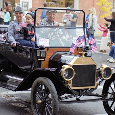 An old-time vehicle being driven in the Veterans Day Parade Nov. 12, 2016. Photo by Richard Hayward&nbsp;of Clarkston.