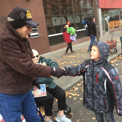 My son went up to a veteran just before the parade started (Saturday, Nov. 10) and shook his hand and thanked him for his service. The excitement in his face brought tears to my eyes. Julie Simmons took this photo of her son Landon, 7, shaking Command Sergeant Boyd Pederson, a retired major for the state of Idaho. Warms my heart to see the excitement in a veteran's face and makes me feel good when I am told I am teaching my kids to do the right thing. Thank you Boyd for your service!!